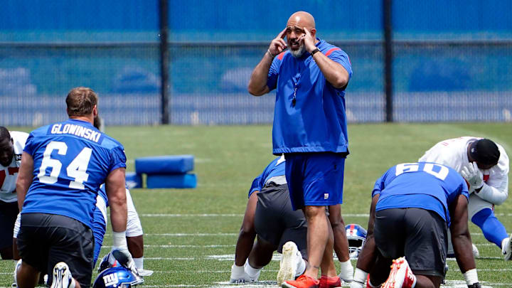 New York Giants offensive line coach Bobby Johnson on the field for mandatory minicamp at the Quest