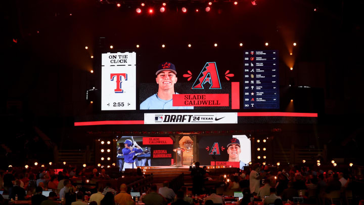 Jul 14, 2024; Ft. Worth, TX, USA; Slade Caldwell is drafted by the Arizona Diamondbacks with the 29th pick during the first round of the MLB Draft at Cowtown Coliseum. Mandatory Credit: Kevin Jairaj-USA TODAY Sports Jul 14, 2024; Ft. Worth, TX, USA; Slade Caldwell is drafted by the Arizona Diamondbacks with the 29th pick during the first round of the MLB Draft at Cowtown Coliseum. Mandatory Credit: Kevin Jairaj-USA TODAY Sports