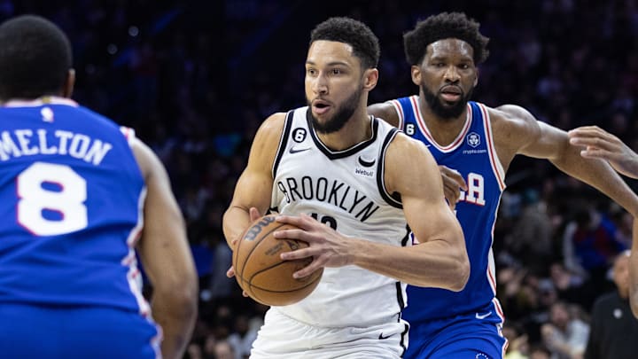 Jan 25, 2023; Philadelphia, Pennsylvania, USA; Brooklyn Nets guard Ben Simmons (10) controls the ball in front of Philadelphia 76ers center Joel Embiid (21) during the second quarter at Wells Fargo Center. Mandatory Credit: Bill Streicher-Imagn Images