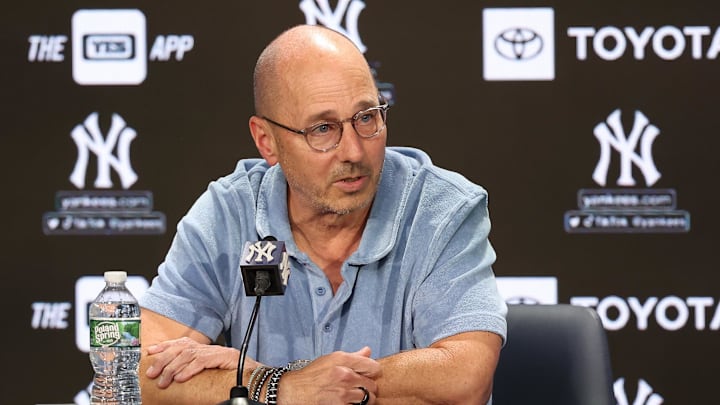 Aug 23, 2023; Bronx, New York, USA; New York Yankees general manager Brian Cashman talks with the media before the game between the Yankees and the Washington Nationals at Yankee Stadium. Mandatory Credit: Vincent Carchietta-Imagn Images
