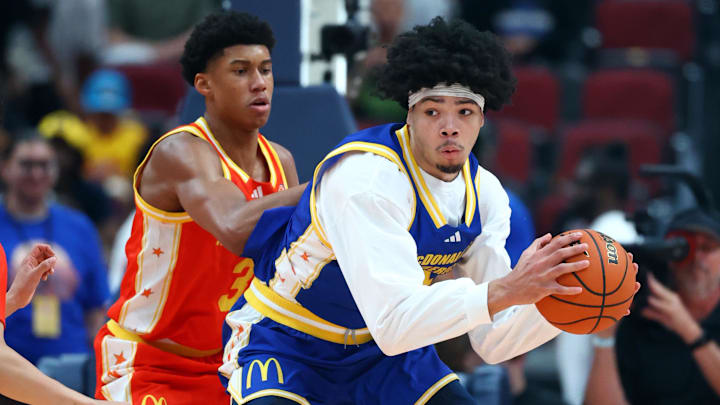 Mar 31, 2026; Glendale, AZ, USA; Tyran Stokes (4) controls the ball against Bruce Branch III (3) during the McDonalds All American Boys Game at Desert Diamond Arena. 