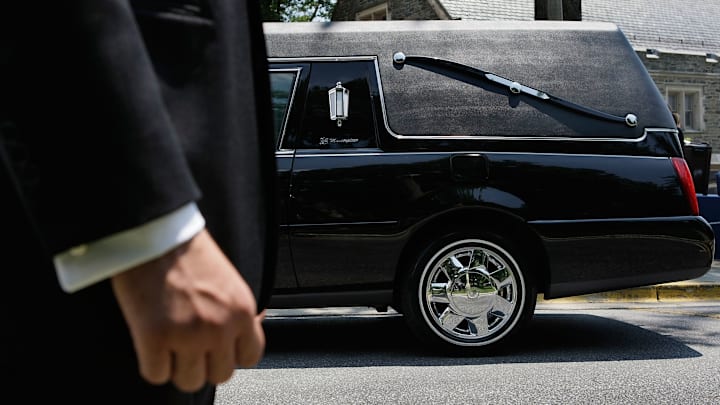 A hearse with S-shaped bars in place of back windows.
