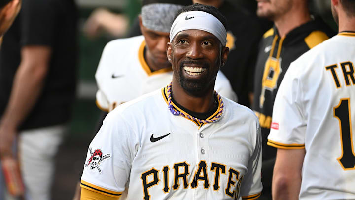 Jun 9, 2025; Pittsburgh, Pennsylvania, USA;  Pittsburgh Pirates designated hitter Andrew McCutchen (20) celebrates after scoring against the Miami Marlins during the third inning at PNC Park. Mandatory Credit: Philip G. Pavely-Imagn Images