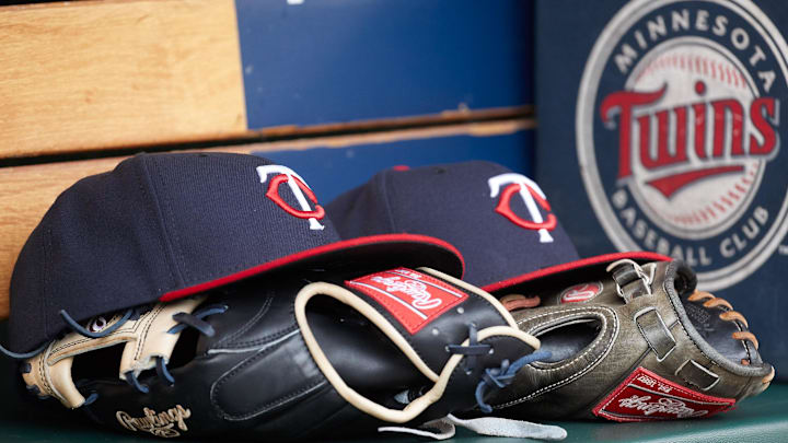 Apr 13, 2017; Detroit, MI, USA; Minnesota Twins hat and glove in the dugout during the game against the Minnesota Twins at Comerica Park. Mandatory Credit: Rick Osentoski-Imagn Images