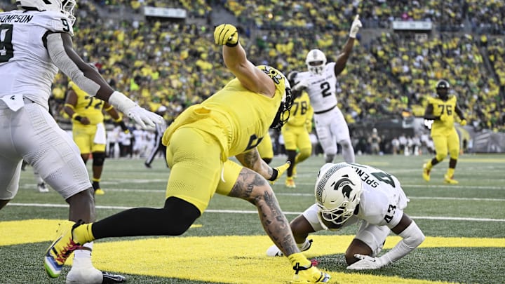 Oct 4, 2024; Eugene, Oregon, USA; Michigan State Spartans defensive back Malik Spencer (43) intercepts a pass during the first half against the Oregon Ducks at Autzen Stadium. Mandatory Credit: Troy Wayrynen-Imagn Images