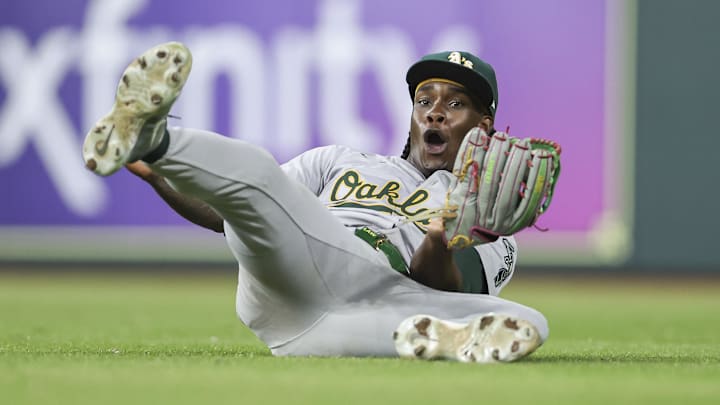 Sep 11, 2024; Houston, Texas, USA; Oakland Athletics right fielder Lawrence Butler (4) reacts after making a catch on a fly ball during the eighth inning against the Houston Astros at Minute Maid Park. Mandatory Credit: Troy Taormina-Imagn Images