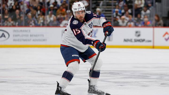 Jan 10, 2026; Denver, Colorado, USA; Columbus Blue Jackets defenseman Dante Fabbro (15) controls the puck in the third period against the Colorado Avalanche at Ball Arena. Mandatory Credit: Isaiah J. Downing-Imagn Images