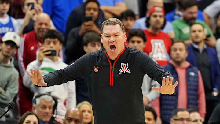 Mar 27, 2025; Newark, NJ, USA; Arizona Wildcats head coach Tommy Lloyd during the second half against the Duke Blue Devils during an East Regional semifinal of the 2025 NCAA tournament at Prudential Center. Mandatory Credit: Robert Deutsch-Imagn Images Mar 27, 2025; Newark, NJ, USA; Arizona Wildcats head coach Tommy Lloyd during the second half against the Duke Blue Devils during an East Regional semifinal of the 2025 NCAA tournament at Prudential Center. Mandatory Credit: Robert Deutsch-Imagn Images