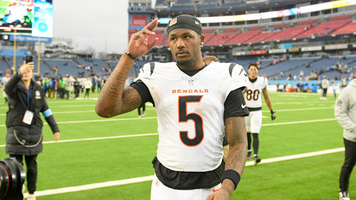 Dec 15, 2024; Nashville, Tennessee, USA;  Cincinnati Bengals wide receiver Tee Higgins (5) salutes the Cincinnati Bengals fans that traveled against the Tennessee Titans post game  at Nissan Stadium. Mandatory Credit: Steve Roberts-Imagn Images