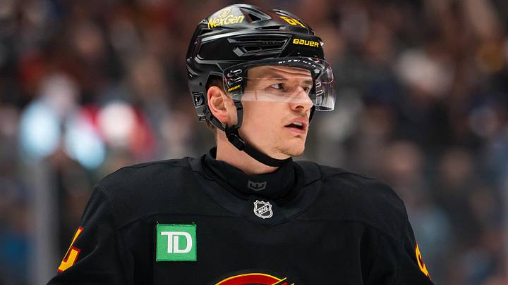 Jan 31, 2026; Vancouver, British Columbia, CAN; Vancouver Canucks forward David Kampf (64) during a stop in play against the Toronto Maple Leafs in the first period at Rogers Arena. Mandatory Credit: Bob Frid-Imagn Images