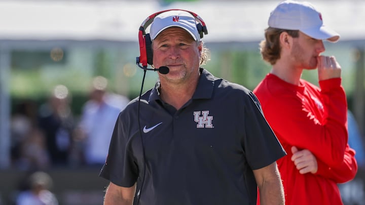 Nov 25, 2023; Orlando, Florida, USA; Houston Cougars head coach Dana Holgorsen walks the sideline during the second quarter against the UCF Knights at FBC Mortgage Stadium. 