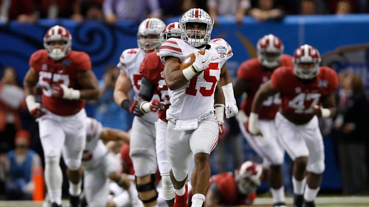 Ohio State Buckeyes running back Ezekiel Elliott (15) runs for an 85-yard touchdown in the fourth quarter of the Allstate Sugar Bowl college football playoff semifinal against the Alabama Crimson Tide at the Mercedes-Benz Superdome in New Orleans on Jan. 1, 2015. (Adam Cairns / The Columbus Dispatch)