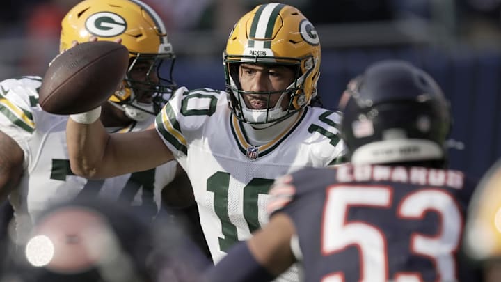 Green Bay Packers quarterback Jordan Love (10) runs for a first down during the third quarter of their game Sunday, November 17, 2024 at Soldier Field in Chicago, Illinois. 