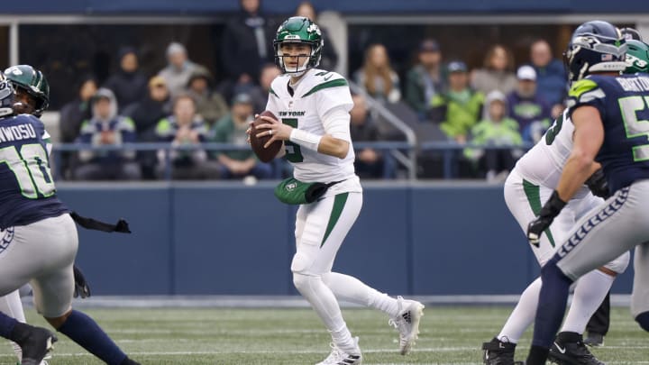 Jan 1, 2023; Seattle, Washington, USA; New York Jets quarterback Mike White (5) looks to pass against the Seattle Seahawks during the second quarter at Lumen Field