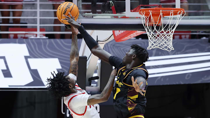 Feb 4, 2026; Salt Lake City, Utah, USA; Arizona State Sun Devils center Massamba Diop (35) blocks the shot of Utah Utes guard Don McHenry (3) during the first half at Jon M. Huntsman Center. Mandatory Credit: Rob Gray-Imagn Images