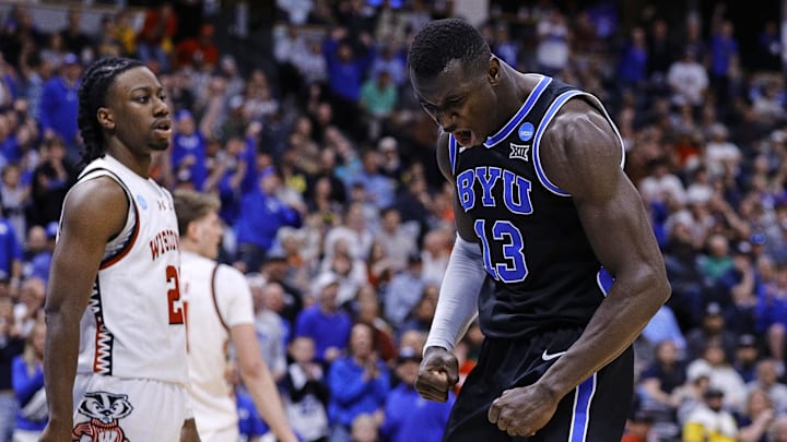 Mar 22, 2025; Denver, CO, USA; Brigham Young Cougars center Keba Keita (13) reacts against the Wisconsin Badgers during the second half in the second round of the NCAA Tournament  at Ball Arena. Mandatory Credit: Isaiah J. Downing-Imagn Images
