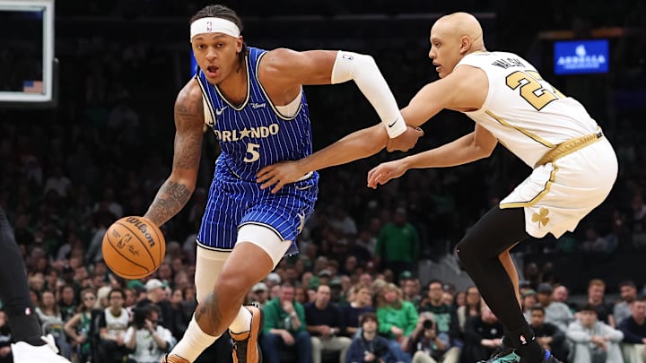 Apr 12, 2026; Boston, Massachusetts, USA; Orlando Magic forward Paolo Banchero (5) drives to the basket defended by Boston Celtics forward Jordan Walsh (27) during the first half at TD Garden. Mandatory Credit: Paul Rutherford-Imagn Images Apr 12, 2026; Boston, Massachusetts, USA; Orlando Magic forward Paolo Banchero (5) drives to the basket defended by Boston Celtics forward Jordan Walsh (27) during the first half at TD Garden. Mandatory Credit: Paul Rutherford-Imagn Images