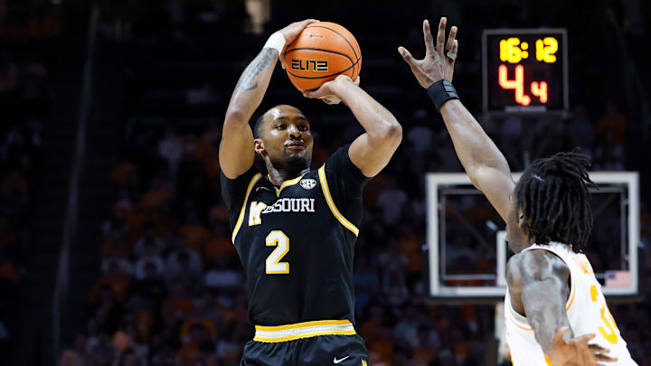 Missouri Tigers guard Tamar Bates (2) rises for a shot against a defender, in a game versus the Tennessee Volunteers this season.