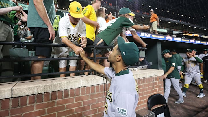 Aug 9, 2025; Baltimore, Maryland, USA; Athletics third baseman Darell Hernaiz (2) greets fans after a game against the Baltimore Orioles at Oriole Park at Camden Yards. Mandatory Credit: Daniel Kucin Jr.-Imagn Images