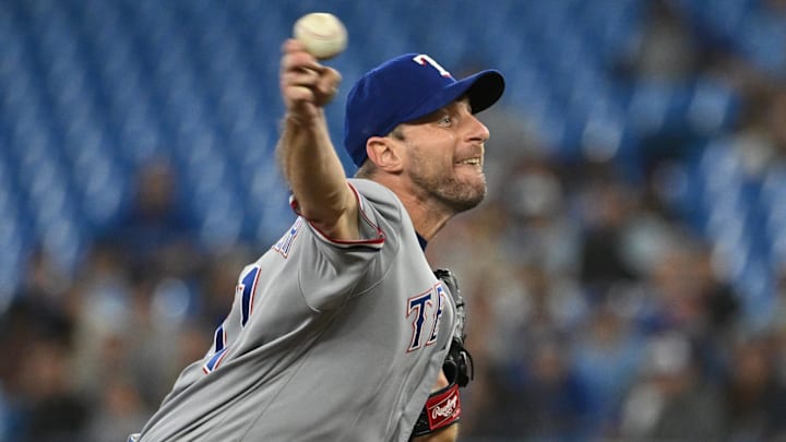 Sep 12, 2023; Toronto, Ontario, CAN;   Texas Rangers starting pitcher Max Scherzer (31) delivers a pitch against the Toronto Blue Jays in the first inning at Rogers Centre.