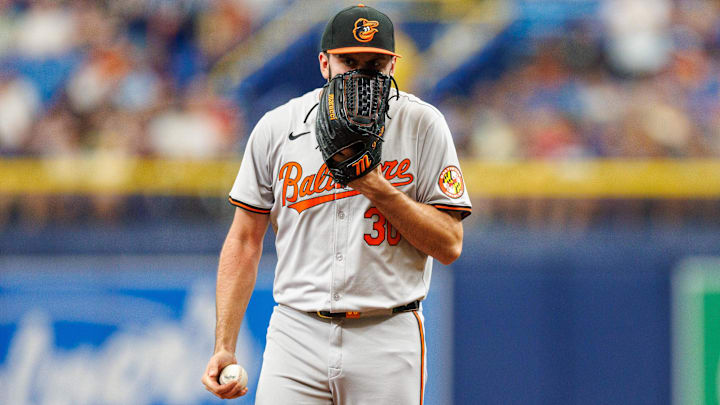 Jun 9, 2024; St. Petersburg, Florida, USA;  Baltimore Orioles pitcher Grayson Rodriguez (30) reacts after giving up a run against the Tampa Bay Rays in the sixth inning at Tropicana Field. 
