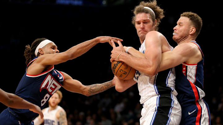 Dec 18, 2021; Brooklyn, New York, USA; Orlando Magic center Robin Lopez (33) controls the ball