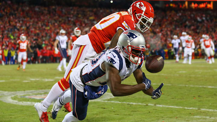 Jan 20, 2019; Kansas City, MO, USA; New England Patriots wide receiver Phillip Dorsett (13) is unable to make the catch as Kansas City Chiefs cornerback Steven Nelson (20) defends in the AFC Championship game at Arrowhead Stadium. Mandatory Credit: Jay Biggerstaff-Imagn Images