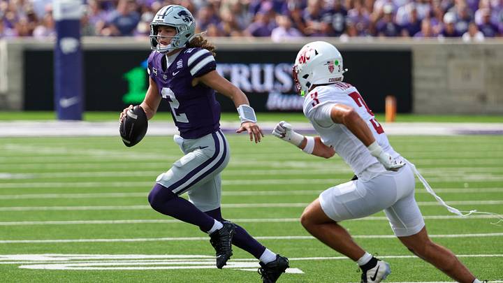 Sep 12, 2026; Manhattan, Kansas, USA; Kansas State Wildcats quarterback Avery Johnson (2) runs away from Washington State Cougars cornerback Jamarey Smith (2) during the first quarter at Bill Snyder Family Football Stadium. Mandatory Credit: Scott Sewell-Imagn Images Sep 12, 2026; Manhattan, Kansas, USA; Kansas State Wildcats quarterback Avery Johnson (2) runs away from Washington State Cougars cornerback Jamarey Smith (2) during the first quarter at Bill Snyder Family Football Stadium. Mandatory Credit: Scott Sewell-Imagn Images