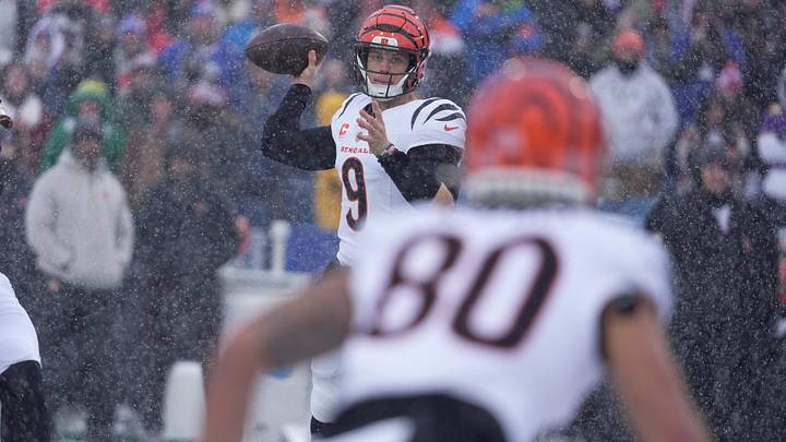 Cincinnati Bengals quarterback Joe Burrow gets ready to launch a pass to Cincinnati Bengals wide receiver Andrei Iosivas during first half action at Highmark Stadium in Orchard Park on Dec. 7, 2025. Cincinnati Bengals quarterback Joe Burrow gets ready to launch a pass to Cincinnati Bengals wide receiver Andrei Iosivas during first half action at Highmark Stadium in Orchard Park on Dec. 7, 2025.