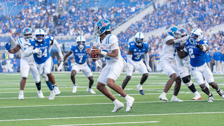 Ole Miss quarterback Austin Simmons (13) dropped back to pass as the Kentucky Wildcats faced off against the Ole Miss Rebels at Kroger Field in Lexington, Kentucky on Saturday, September 6, 2025. Ole Miss defeated Kentucky, 30-23. Ole Miss quarterback Austin Simmons (13) dropped back to pass as the Kentucky Wildcats faced off against the Ole Miss Rebels at Kroger Field in Lexington, Kentucky on Saturday, September 6, 2025. Ole Miss defeated Kentucky, 30-23.