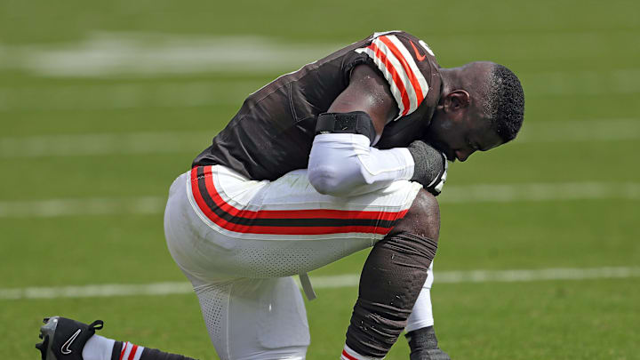Cleveland Browns linebacker Jeremiah Owusu-Koramoah (6) pauses for a moment of reflection during the first half of an NFL football game at Huntington Bank Field, Sunday, Sept. 22, 2024, in Cleveland, Ohio.