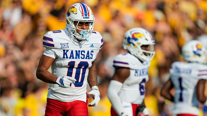 Sep 6, 2025; Columbia, Missouri, USA; Kansas Jayhawks wide receiver Levi Wentz (10) gets into position prior to the snap during the second half against the Missouri Tigers at Faurot Field at Memorial Stadium. Mandatory Credit: Jay Biggerstaff-Imagn Images Sep 6, 2025; Columbia, Missouri, USA; Kansas Jayhawks wide receiver Levi Wentz (10) gets into position prior to the snap during the second half against the Missouri Tigers at Faurot Field at Memorial Stadium. Mandatory Credit: Jay Biggerstaff-Imagn Images