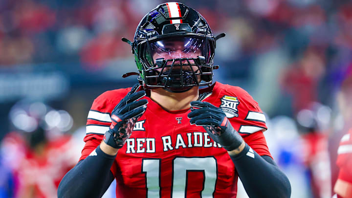 Texas Tech Red Raiders linebacker Jacob Rodriguez (10) warms up before the game against the BYU Cougars at AT&T Stadium. 