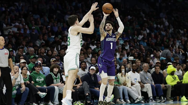 Mar 29, 2026; Charlotte, North Carolina, USA; Charlotte Hornets guard LaMelo Ball (1) shoots over Boston Celtics guard Hugo González (28) during the second half at Spectrum Center. Mandatory Credit: Brian Westerholt-Imagn Images