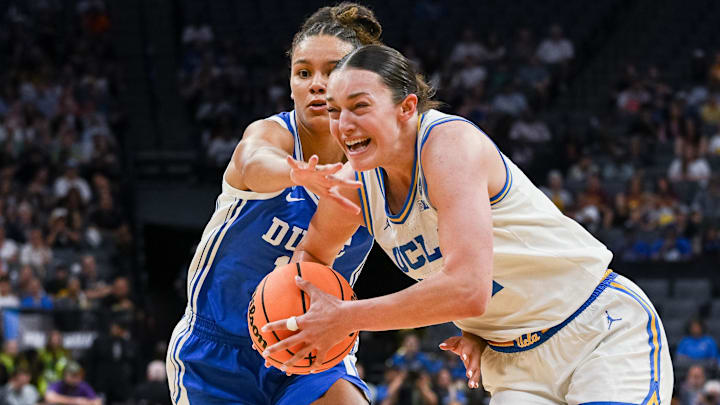 Mar 29, 2026; Sacramento, CA, USA; UCLA Bruins forward Angela Dugalić (32) drives to the basket against Duke Blue Devils forward Delaney Thomas (12) during the second quarter in the Sacramento Regional 4 of the women's 2026 NCAA Tournament at the Golden 1 Center. Mandatory Credit: Ed Szczepanski-Imagn Images