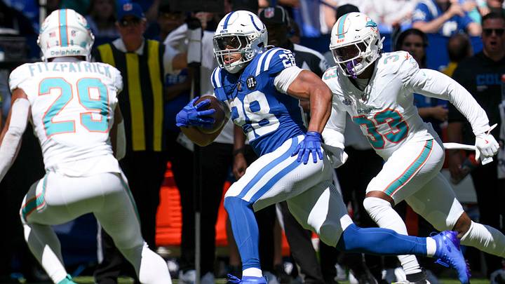 Miami Dolphins safety Minkah Fitzpatrick (29) and cornerback Jason Marshall Jr. (33) attempt to bring down Indianapolis Colts running back Jonathan Taylor (28) during the first half of a game Sunday, Sept. 7, 2025, at Lucas Oil Stadium in Indianapolis. Miami Dolphins safety Minkah Fitzpatrick (29) and cornerback Jason Marshall Jr. (33) attempt to bring down Indianapolis Colts running back Jonathan Taylor (28) during the first half of a game Sunday, Sept. 7, 2025, at Lucas Oil Stadium in Indianapolis.