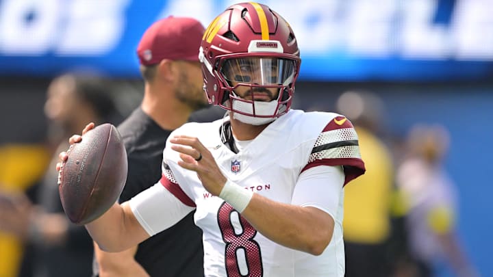 Oct 5, 2025; Inglewood, California, USA; Washington Commanders quarterback Marcus Mariota (8) warms up before the game against the Los Angeles Chargers at SoFi Stadium. 