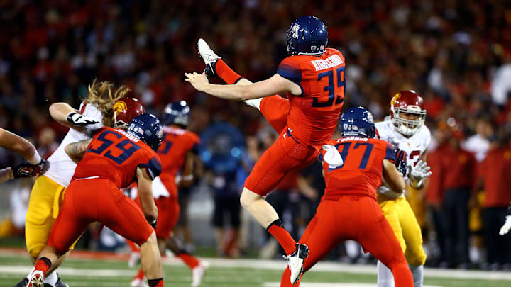 Oct 11, 2014; Tucson, AZ, USA; Arizona Wildcats punter Drew Riggleman (39) against the Southern California Trojans at Arizona Stadium. Mandatory Credit: Mark J. Rebilas-Imagn Images
