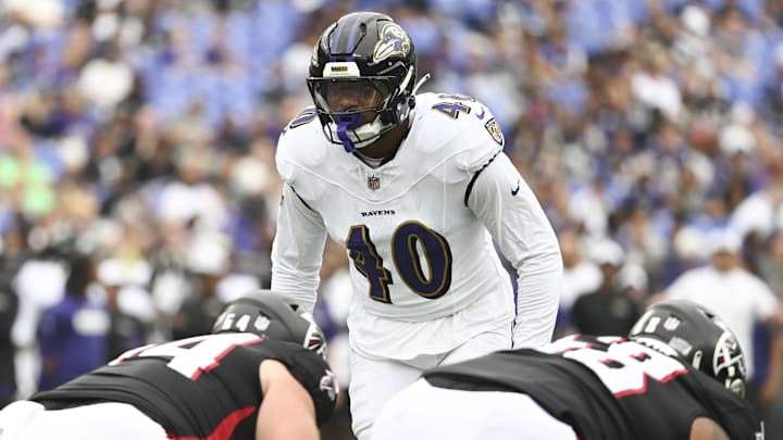 Aug 17, 2024; Baltimore, Maryland, USA; Baltimore Ravens linebacker Malik Harrison (40) looks to rush the pass  during the first half 
against the Atlanta Falcons at M&T Bank Stadium. Mandatory Credit: Tommy Gilligan-Imagn Images