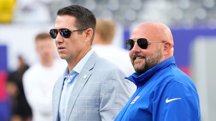 Aug 26, 2023; East Rutherford, New Jersey, USA; New York Giants head coach Brian Daboll (right) and general manager Joe Schoen (left) talk before a game against the New York Jets at MetLife Stadium.  