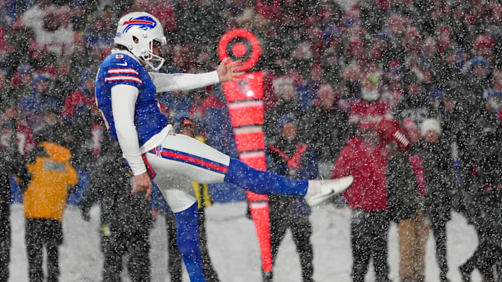 Dec 1, 2024; Orchard Park, New York, USA; Buffalo Bills punter Sam Martin (8) punts the ball against the San Francisco 49ers during the first half at Highmark Stadium. 