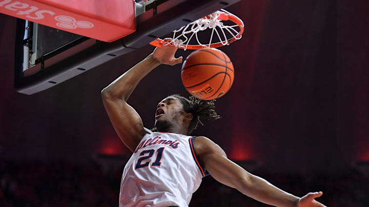 Feb 15, 2025; Champaign, Illinois, USA;  Illinois Fighting Illini forward Morez Johnson Jr. (21) dunks the ball during the first half against the Michigan State Spartans at State Farm Center. Mandatory Credit: Ron Johnson-Imagn Images