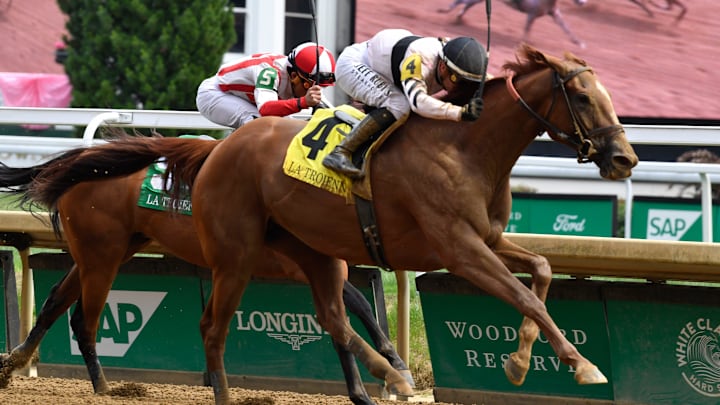 Raging Sea, with Flavien Prat up, leads the pack to the finish line to win the 40 running of The La Troienne, Friday, May 2, 2025 in Louisville Ky.