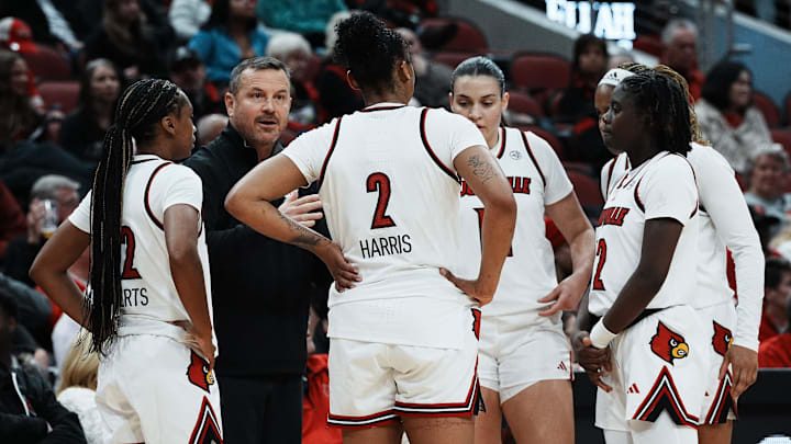 Louisville head coach Jeff Walz instructed his team against Oklahoma during their game at the KFC Yum! Center in Louisville, Ky. on Dec. 4, 2024. Louisville head coach Jeff Walz instructed his team against Oklahoma during their game at the KFC Yum! Center in Louisville, Ky. on Dec. 4, 2024.