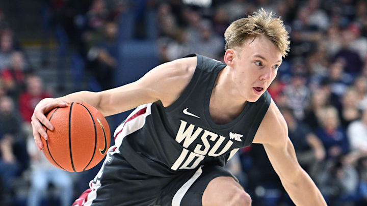 Jan 11, 2025; Spokane, Washington, USA; Washington State Cougars guard Parker Gerrits (10) controls the ball against the Gonzaga Bulldogs in the first half at McCarthey Athletic Center. Mandatory Credit: James Snook-Imagn Images Jan 11, 2025; Spokane, Washington, USA; Washington State Cougars guard Parker Gerrits (10) controls the ball against the Gonzaga Bulldogs in the first half at McCarthey Athletic Center. Mandatory Credit: James Snook-Imagn Images