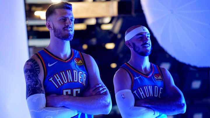 Isaiah Hartenstein and Alex Caruso pose for their photo. Thunder media day ay the Paycom Center Monday, Sept. 30, 2024.