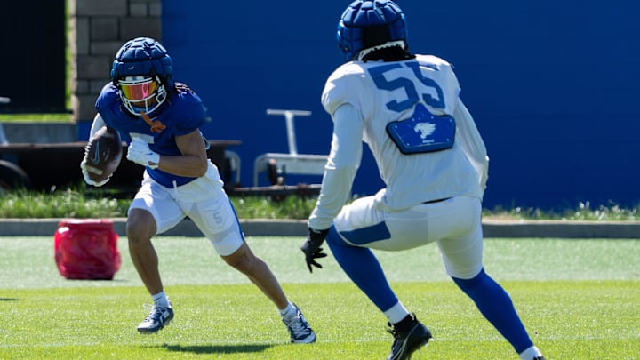 University of Kentucky wide receiver Anthony Brown-Stephens makes his way around offensive linebacker Noah Matthews during spring football practice on Saturday, April 6, 2024. University of Kentucky wide receiver Anthony Brown-Stephens makes his way around offensive linebacker Noah Matthews during spring football practice on Saturday, April 6, 2024.