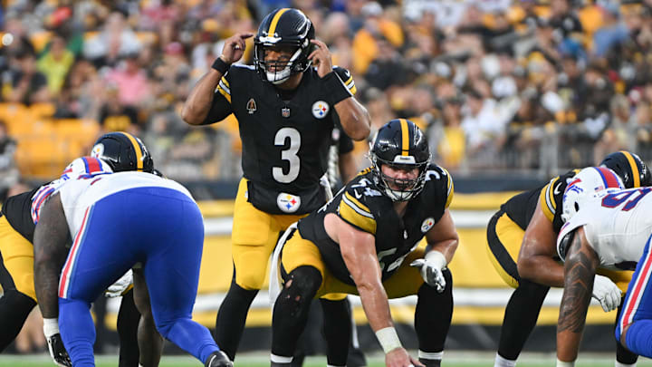 Aug 17, 2024; Pittsburgh, Pennsylvania, USA;  Pittsburgh Steelers quarterback Russell Wilson (3) calls out a coverage while waiting for center Zach Frazier (54) to snap the ball against the Buffalo Bills during the first quarter at Acrisure Stadium. Mandatory Credit: Barry Reeger-Imagn Images