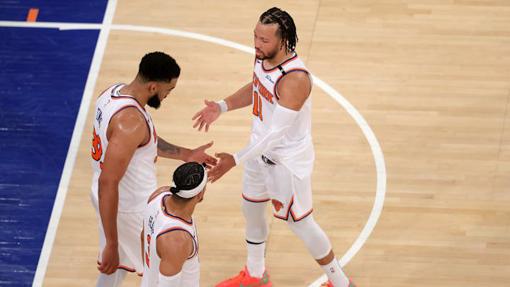 May 29, 2025; New York, New York, USA; New York Knicks guard Jalen Brunson (11) and center Karl-Anthony Towns (32) and guard Josh Hart (3) react in the fourth quarter against the Indiana Pacers during game five of the eastern conference finals for the 2025 NBA Playoffs at Madison Square Garden. Mandatory Credit: Brad Penner-Imagn Images