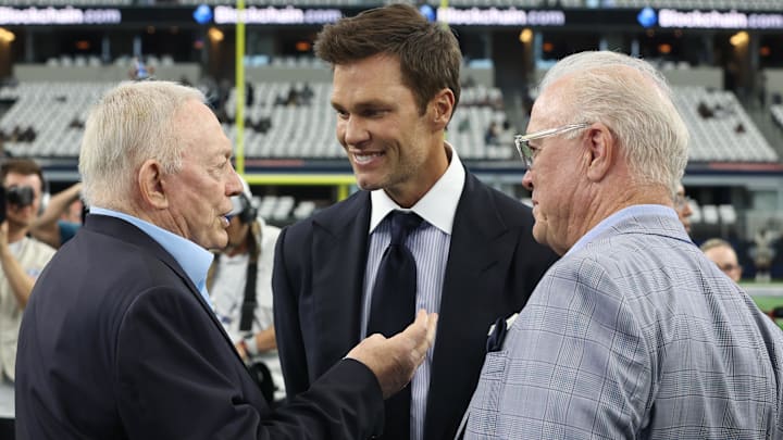 Sep 15, 2024; Arlington, Texas, USA; (L ro R) Dallas Cowboys owner Jerry Jones, Fox Sports commentator Tom Brady and Cowboys CEO Stephen Jones talk on the field before a game between the New Orleans Saints and Cowboys at AT&T Stadium. Mandatory Credit: Tim Heitman-Imagn Images